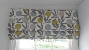 Scion fabric roman blind on rotary header rail - Dumbleton