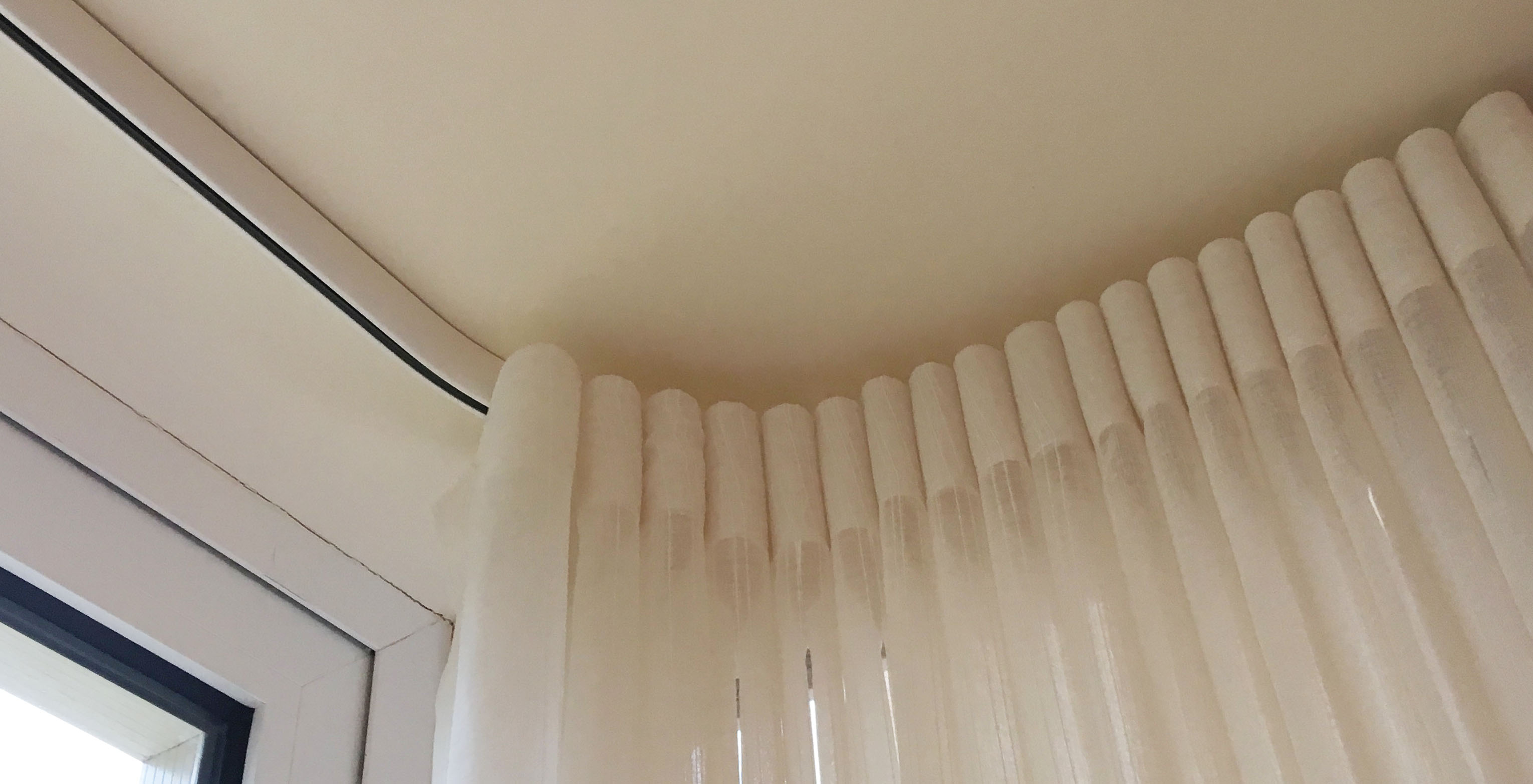 Floor to ceiling linen effect voile with wave heading. Gloucestershire curtain maker