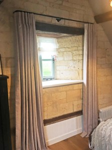 Inverted pleat linen curtains on 19mm diameter black French pole, with sheer linen roman blind. Cotswold Barn conversion near Cheltenham.