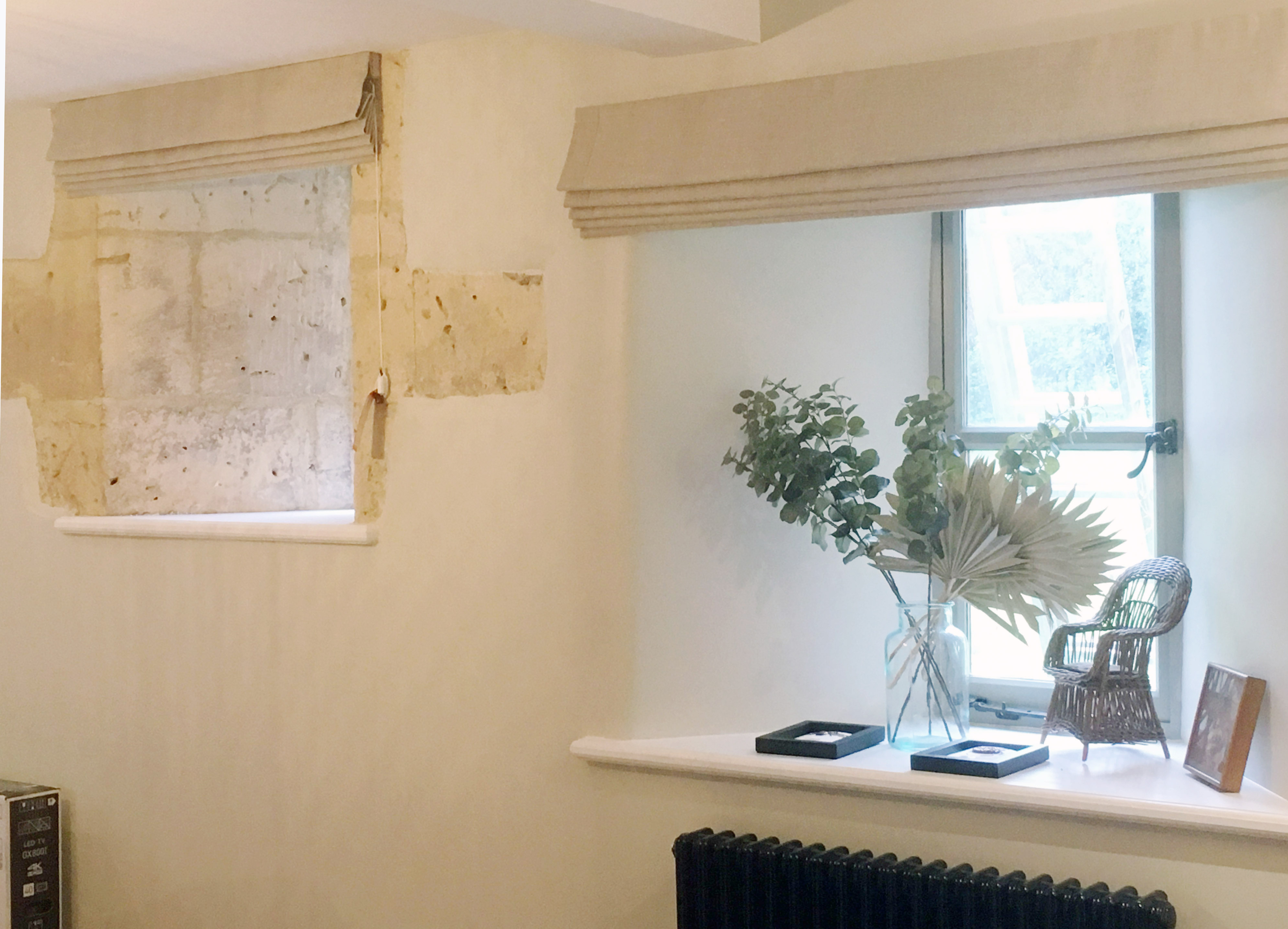 Slubby linen roman blinds in Cotswold barn conversion near Cheltenham, Gloucestershire