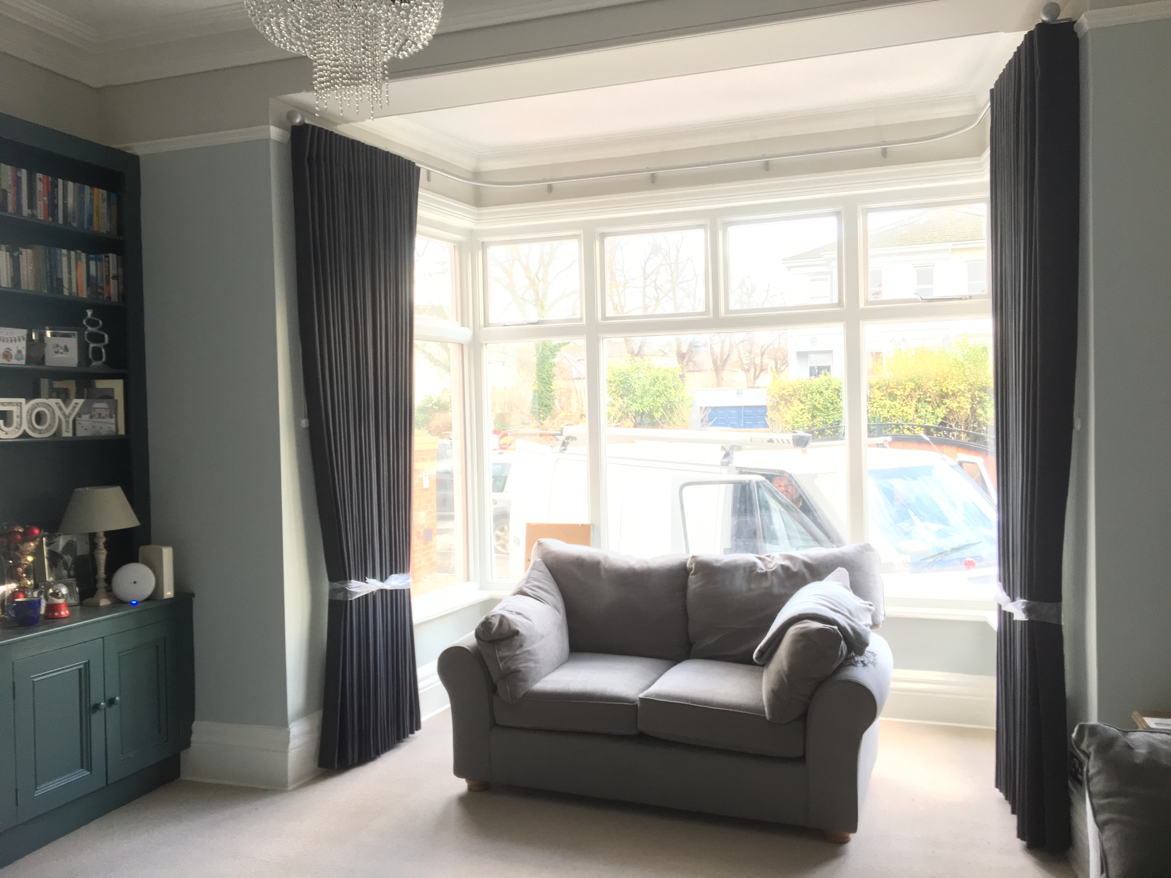 Cartridge pleat curtains on Silent Gliss Metropole in bay window - Cheltenham Town House